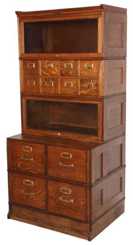 Yawman & Erbe Oak Sectional File Cabinet: Yawman & Erbe Oak Stacking Sectional File Cabinet. Cabinet has 2 sections with 2 file drawers at the bottom, brass pulls and index frames, 2 barrister bookcase sections and a single section with 8 car