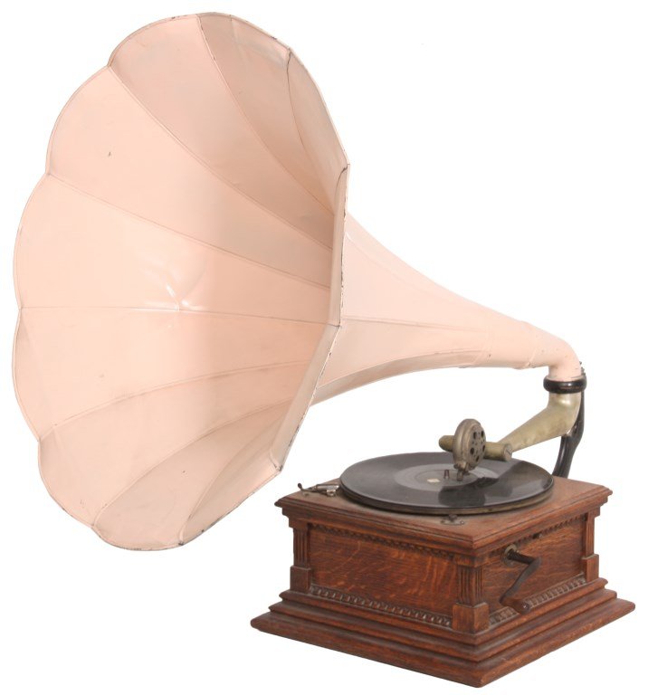 Oak Victor "Type M" Phonograph: Oak Victor Type M Phonograph. Oak case has fluted corner pilasters and carved trim; 10 in. double spring driven turntable, Victor decal on the front and brass tag on the right side reads “Victor Tal