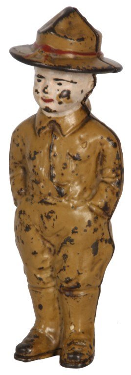 Dough Boy W.W.I. Soldier Still Bank: Cast Iron Dough Boy W.W.I. Soldier Still Bank. By Grey Iron Toy Co., c.1919; standing dough boy figure with hands in his pockets, original paint has some wear and chipping, coin slot is in the rear. 7