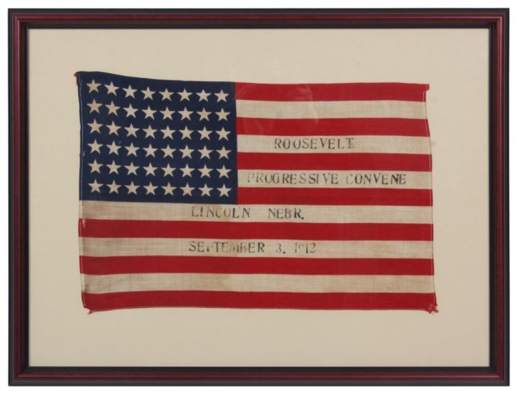 Circa 1912 Theodore Roosevelt Banner Flag: Circa 1912 Theodore Roosevelt Banner Flag. 48 stars and 13 stripes, the flag is in very good condition with only light frays at the corners and minor wear along the hoist edge; printed lettering in th