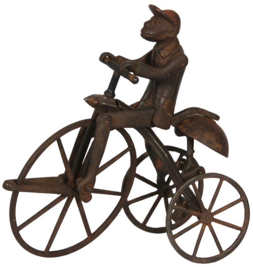 Highwheel Bicycle Bell Toy W/ Monkey: Highwheel Monkey on a Bicycle Pull Toy W/ Bell Toy, by Ives Mfg. Co., c.1890. The mechanical monkey figure has hinged knees and hips which move as the front wheel rotates and a bell at the back rings 