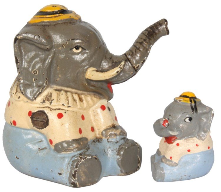 Hubley Circus Elephant Bank & Paperweight: Hubley Mfg. Co. Circus Elephant Cast Iron Still Bank & Paperweight. Both are seated elephant figures with trunks pointed up and to their left, they wear a yellow hat with ribbons, white with red polka