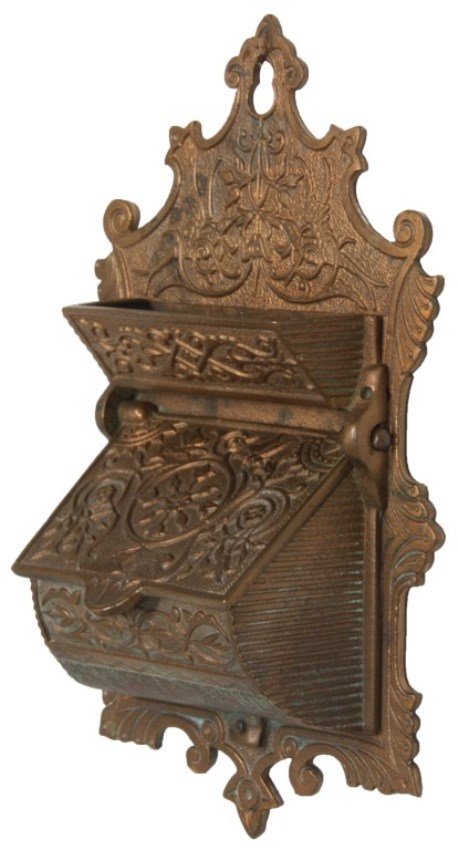 2 Victorian Brass Wall Hanging Match Safes: 2 Victorian Brass Wall Hanging Match Safes. One aesthetic design pierced brass with relief decorations, hinged lid over top bin and signed under the lid Reading Hardware Co. 6.5 in. high. The other is