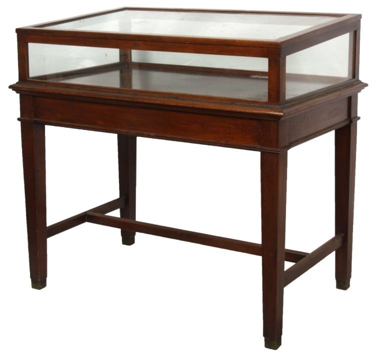 Walnut Lift Top Store Display Cabinet: Walnut Lift Top Store Display Cabinet. Stands on 4 square tapered legs with stretchers, has glass panels on the sides of the case with a slanted glass panel lift top. In good condition and original fi