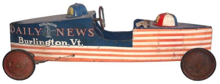 Daily News Burlington, VT Soapbox Car: Daily News Burlington, VT Soapbox Car. Painted wood panels have a double tapered form with red & white stripes and blue American flag theme with display ad for Burlington Dailey News, Burlington, VT. 