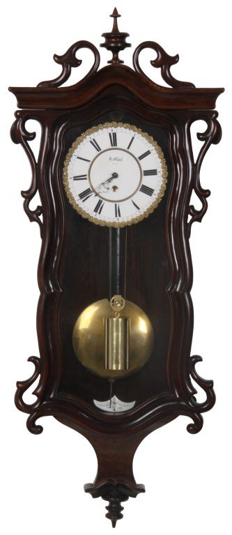 German Weight Driven Vienna Regulator: German Weight Driven Vienna Regulator. 7 in. inset porcelain dial has black Roman hour numerals, fancy hands, filigree decorated gilt brass bezel and signed H. Gibel, Wien; brass weight driven 8 day t