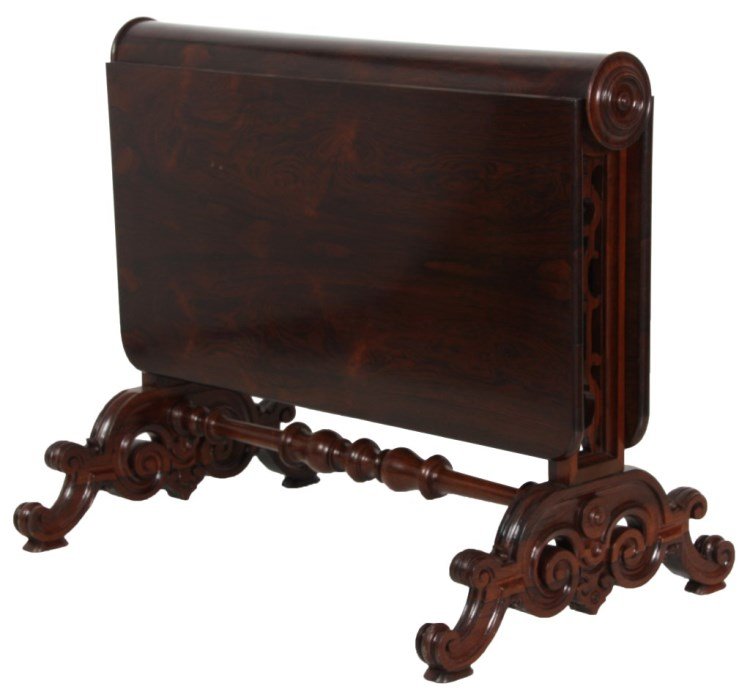 Rosewood Book Table Attr. Alexander Roux: Rosewood Book Table Attr. Alexander Roux. Exceptional grained drop leaves swiveling around a cylindrical center post; pierced carved side supports, fancy scrolling legs and turned center stretcher. In