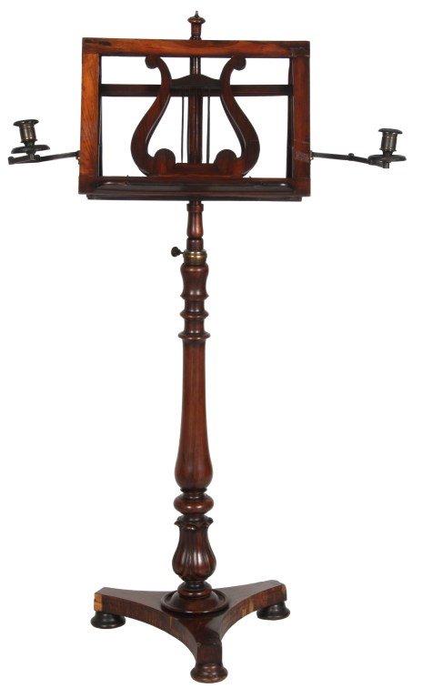 Rosewood Lyre Double Music Stand: Rosewood Lyre Double Music Stand. Concave triangular platform base on turned feet, has a long turned post with leaf carved cluster at the bottom and turned finial at the top; the double sided sheet mu