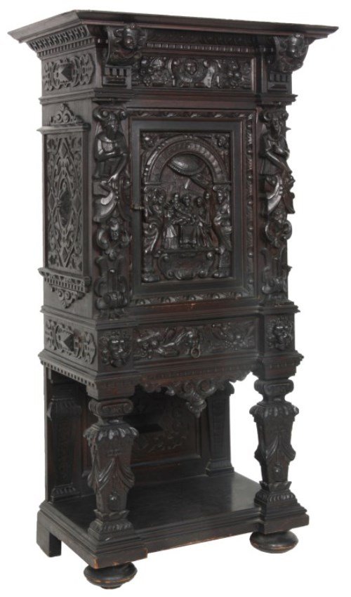 Heavily Carved Oak 1 Door Cabinet: Heavily Carved Oak 1 Door Cabinet. Overhanging cornice top with cherubs head on the corbels, winged cherubs head and fruit on the frieze, figural men carved on the pilasters over carved cherubs heads 