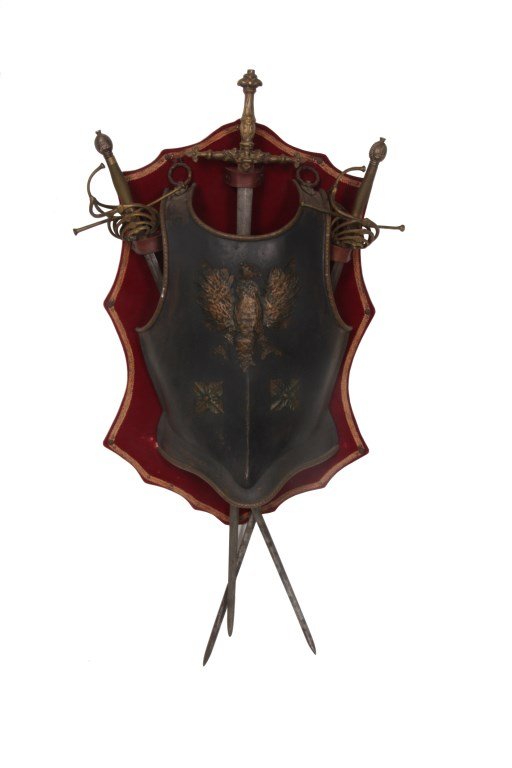 Sword & Armor Wall Mount: Sword & Armor Wall Mount. Hammered metal armor chest plate has brass trim around the edges and is mounted with a hammered copper eagle over 2 florets on the front; has 3 crossed swords with engraved s