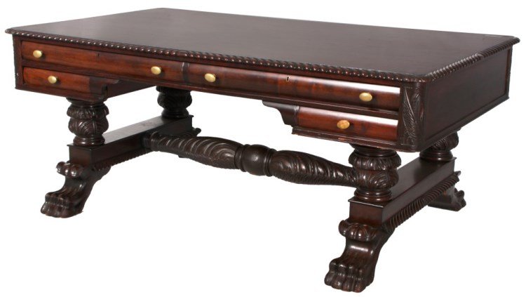 Acanthus Carved Mahogany Partner's Desk: Acanthus Carved Mahogany Partner's Desk. Carved base with turned and acanthus carved stretcher and supports; side stretchers are set on oversized paw feet. The top has a gadroon carved edge and leaf c