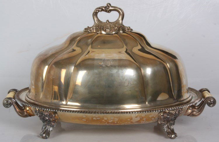 Silver Plated Covered Game Platter: Old Sheffield Silver Plated Covered Game Serving Platter. The large domical lid has a filigree decorated loop handle with lion monogrammed on the front and rear; the platter base has a veined interior