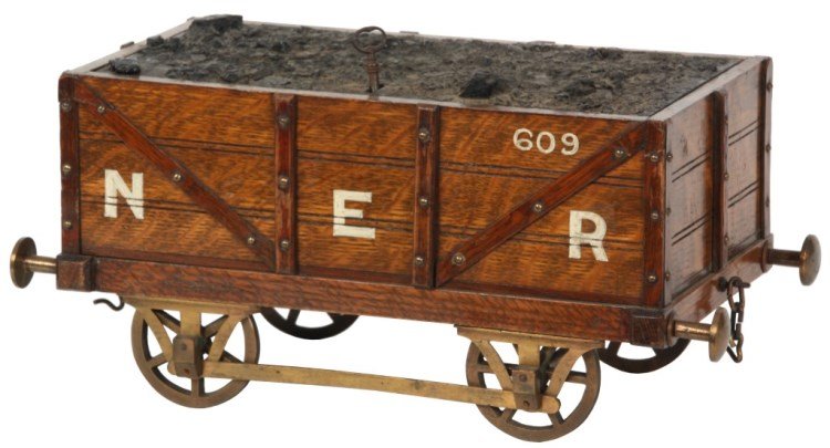 Antique Coal Car Lift Top Smoker’s Box: Antique Coal Car Lift Top Smoker’s Box. Beautiful and unusual tobacco box in the form of an oak No. 609 coal car for the North Eastern Railway, with brass mounts, bumpers and wheels; stamped with Br