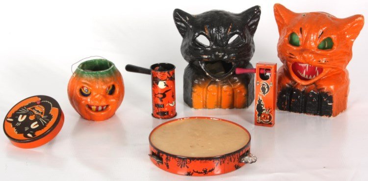 7 Vintage Halloween Toys: 7 Vintage Halloween Toys. Tin litho drum and box noise makers by Kirchhof U.S.A., tin litho tambourine and cylindrical noise makers by T. Cohn Inc. and 3 paper mache jack-o-lanterns, 2 of cat figures