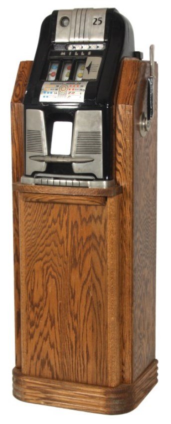 25 Cent Mills Hightop Slot Machine: 25 Cent Mills Hightop Slot Machine. c.1940’s by the Mills Novelty Co., Chicago; black painted aluminum case with 25 cent coin slot in the top, 3 reels with Bell Fruit Gum platinum labels, in good wo