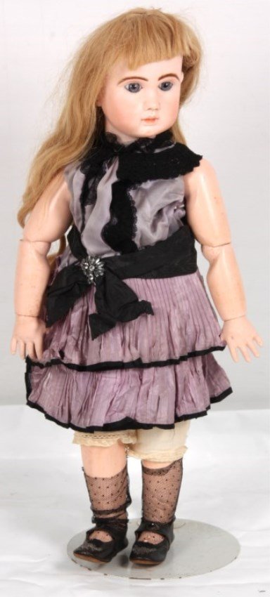 Jules Steiner Bisque Head Bebe Doll: Jules Steiner Bisque Head Bebe Doll. Signed on the head “J. Steiner, Bte. S.G.D.G., Paris, A-20”, has fixed glass eyes, fully articulated composition body. Nice condition. 31 in. high.