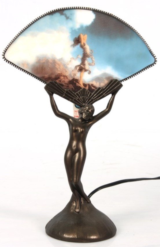 Maxfield Parrish Figural Lamp: Maxfield Parrish Figural Lamp. Fan shaped opalescent glass panel decorated on the front with the Maxfield Parrish scene titled “Ecstasy”; on a spelter deco style figural base. 15 in. high.