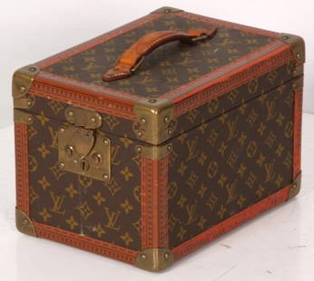 Louis Vuitton Travel Vanity Box: Louis Vuitton Travel Vanity Box. Hard case box with signature monogrammed canvas body, leather edges with leather handle, brass corners, hardware and signed tacks, hinged lid exposes the canvas lined