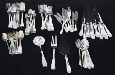 91 Pcs. Tiffany & Co. Sterling Flatware: 91 Pcs. Tiffany & Co. Sterling Flatware. In the Flemish pattern with monogrammed handles “M.B.H.”. Includes 12 Luncheon Forks (7 in.), 12 Hollowware Place Knives (9 1/8 in.), 12 Salad Forks (6.75