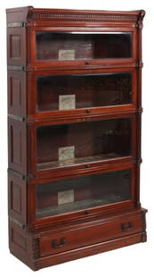 Carved Mahogany Ideal Staking Bookcase: Carved Mahogany Ideal Staking Bookcase. 4 stacking sections with beveled glass lift up doors that slide away into the top, has a single drawer in the base, brass straps on the side of each, which