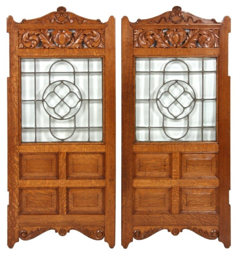 Pr. Oak Double Sided Saloon Doors: Pr. Oak Double Sided Saloon Doors. Carved crest with seashell center, ribbon & wreath carving over a pierced carved filigree panel; square leaded glass panel with beveled glass forming geometric shape
