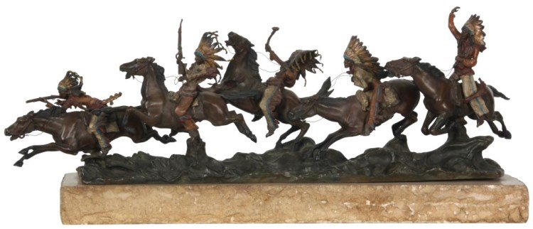 Carl Kauba Cold Painted Bronze Indian Grouping: Carl Kauba (Austria, U.S.A., 1865-1922) cold painted bronze grouping titled Indian Attack (War Party) is a group of 5 Native American Indians riding on horseback in a single line as they charge forwar