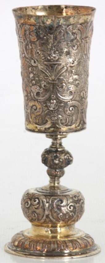 Early German Silver Repousse Chalice: Early German Silver Repousse Chalice. Stepped domical foot with repousse borders, bulbous section in the stem with ram heads and a conical cup with flat bottom. Has early German hallmarks pre-dating 1