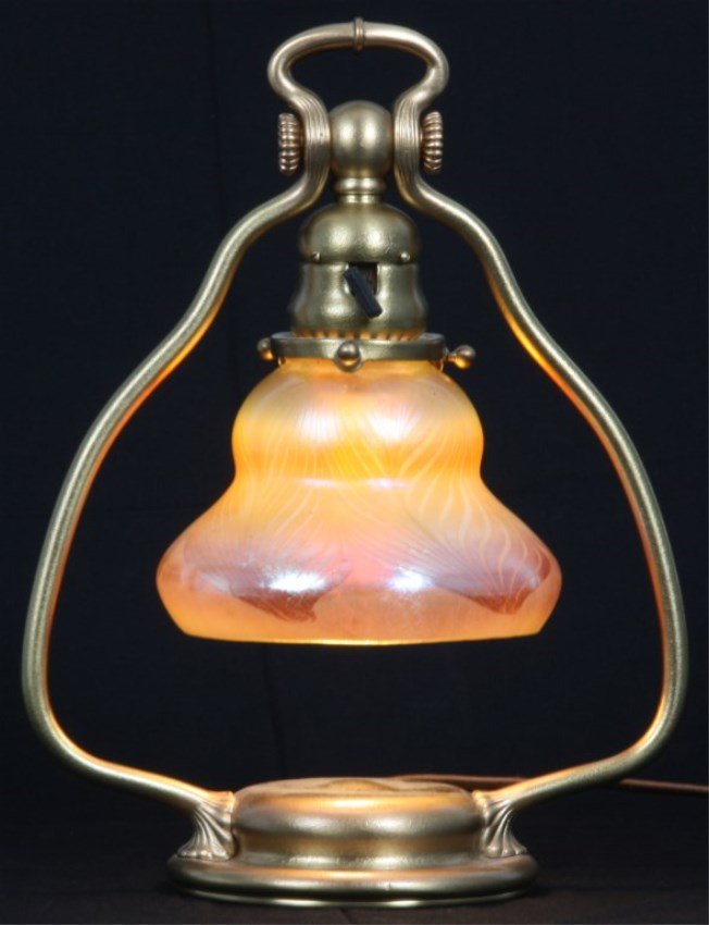 Tiffany Studios Pulled Feather Desk Lamp: Tiffany Studios Pulled Feather Desk Lamp. Dore bronze base number 418 has a weighted base with harp style arms, light cluster hanging from a spherical ball with threaded knobs and single socket below;