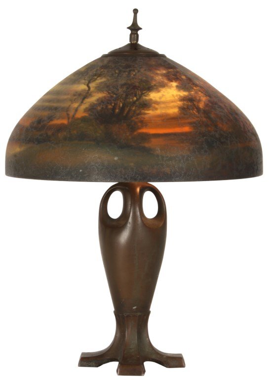 18 in. Handel No. 6534 Reverse Painted Table Lamp: 18 in. Handel No. 6534 Reverse Painted Table Lamp. Domical shade has a lobed form and is reverse painted with a sunset scene of trees and shrubs in a meadow under a colorful orange and yellow backgrou
