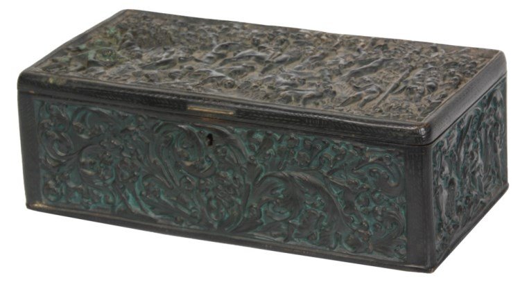 Austrian Bronze Humidor: Austrian Bronze Humidor. The large bronze box has a hinged lid with heavily relief decorated sides depicting forest filigree and figural hunting scenes; has lock & key with a cedar lined interior, mar