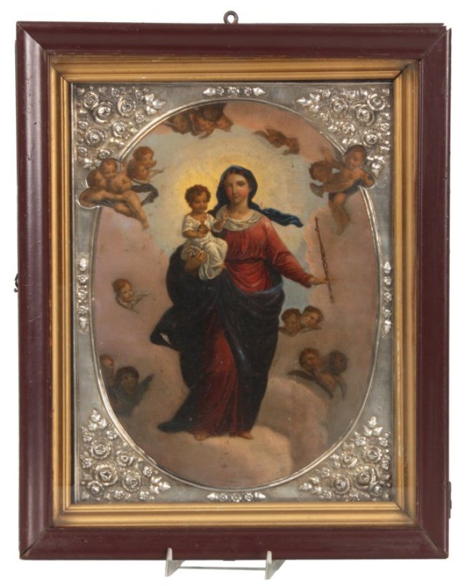 19th C. Russian Silver Overlaid Icon: 19th C. Russian Silver Overlaid Icon. Oil painted on canvas Madonna & Child holding a scepter with winged angles amongst the clouds, mounted on a wood panel; framed in Russian repousse silver overlay 