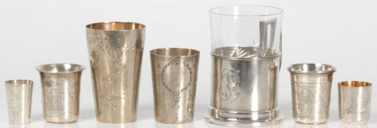 7 Silver Cups: 7 Silver Cups. 5 Russian maked 84. Zol sliver vodka cups with etched design, various sizes and makers; Russian 84 zol. Silver mug with “S.J.” monogram and cut glass insert; and a Polish .800 silve
