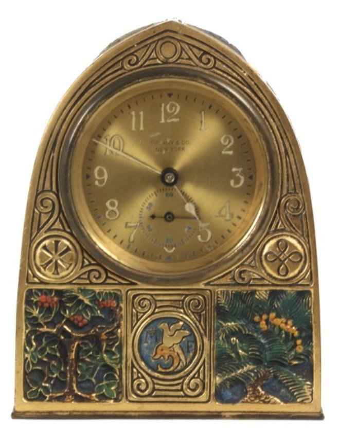 Tiffany Studios Bookmark Pattern Desk Clock: Tiffany Studios Bookmark Pattern Desk Clock. Bronze beehive desk clock signed on the back “Tiffany Studios, New York, 1857”, measures 5.5 in. high having a gilt finish and decorated in the Bookmar