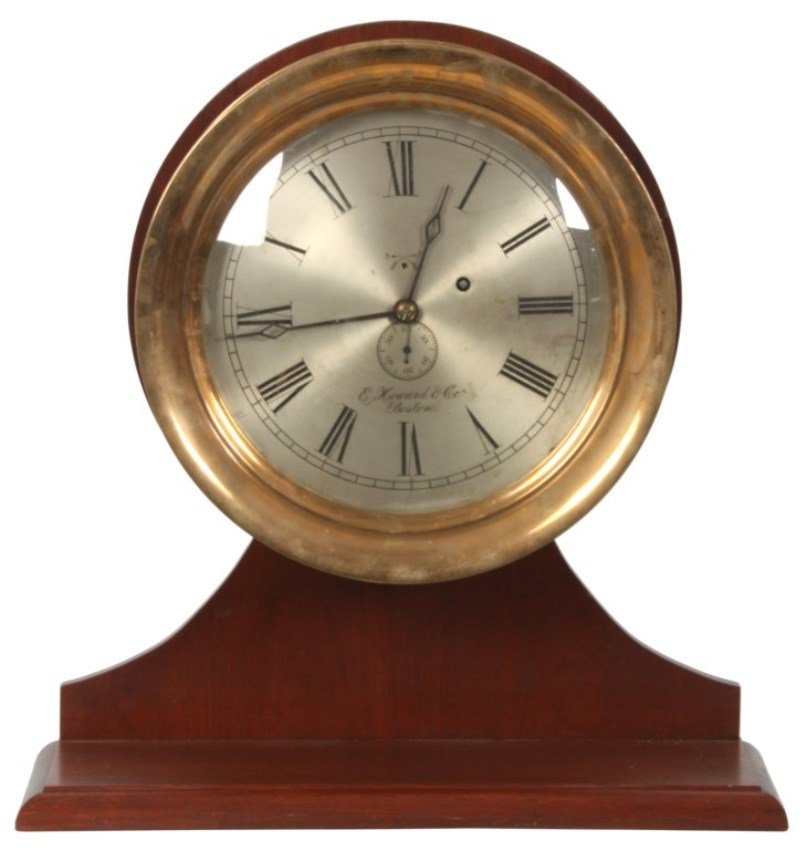 E. Howard & Co. Ship’s Clock: E. Howard & Co. Ship’s Clock. 12 in. silvered dial signed “E. Howard & Co., Boston” has stamped Roman hour numerals, sub seconds dial and blued pierced diamond hands; round brass 8 day spring dr