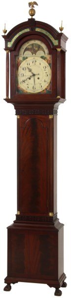 Bawo & Dotter Carved Mahogany Grandfather Clock: Bawo & Dotter Carved Mahogany Grandfather Clock. 12 in. painted metal dial with black Roman hour numerals, 5 minute numbers outside, inner calendar ring, black hands, sweep seconds hand and moon phase