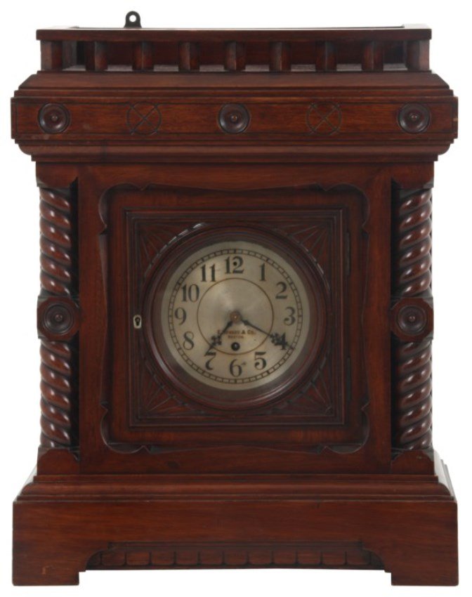 E. Howard & Co. Mahogany Mantle Clock: E. Howard & Co. Mahogany Mantle Clock. 5.5 in. silvered brass dial signed E. Howard & Co., Boston with black incised hour numbers and pierced black hands; brass 8 day spring driven time only movement