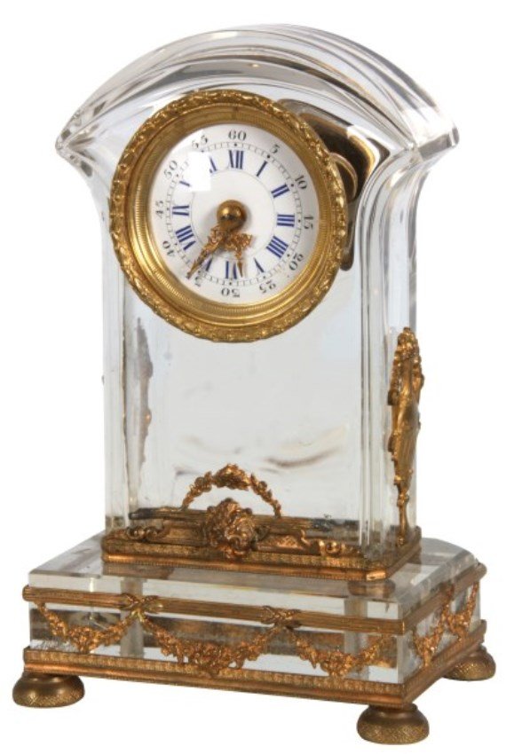 Brass Mounted Crystal Desk Clock: Brass Mounted Crystal Desk Clock. Clear crystal case with pierced gilt brass mounts, trim, feet and bezel; 1.75 in. porcelain dial, small round brass spring driven time only movement with cylinder esc