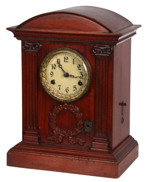 Mahogany New Haven Bracket Clock: Mahogany New Haven Bracket Clock. 5 in. paper dial signed “Made by the New Haven Clock Co., New Haven, Conn., USA”, has fancy pierced hands and hinged brass door bezel with beveled crystal; brass 
