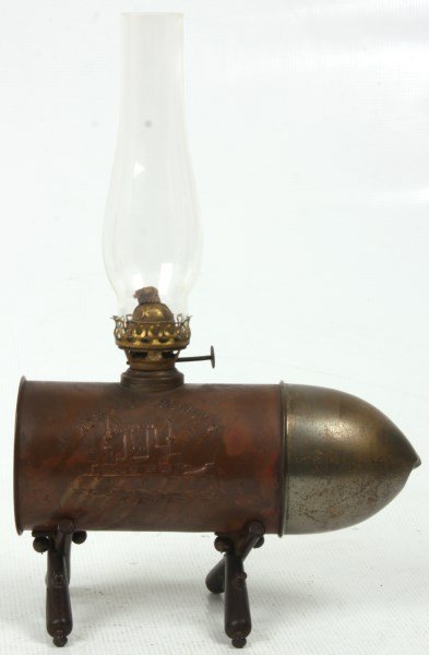 Admiral Dewey’s Remember The Maine Lamp: Admiral Dewey’s Remember The Maine Lamp. Cannon shell brass novelty oil burning lamp with repousse ship design on one side, crossed flags on the other, reads “Admiral Dewey Lamp” & “Remember T