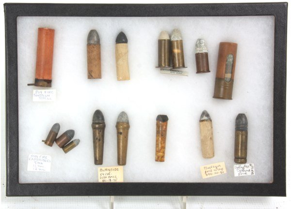 Lot of Early Bullets & Cartridges: Lot of Early Bullets & Cartridges . 16 gauge pin fire shotgun, Maynard 50 caliber, Federal 12 gauge, Gallager 50 caliber & foil wrap, Burnside 54 caliber & pinfire cartridges in 9mm, 11mm & 12mm.