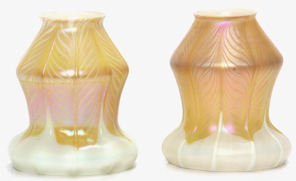 2 Quezal Pulled Feather Artglass Shade: 2 Quezal Pulled Feather Artglass Shade. 10 rib opalescent glass shades with a pale gold iridescent pulled feather décor; signed “Quezal”, shades are in excellent condition with no breaks, cracks 