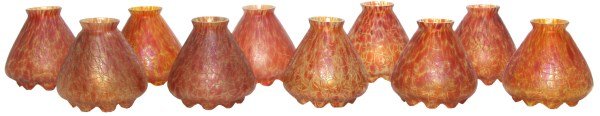 10 Attr: Loetz Artglass Shades: 10 Attr: Austrian Artglass Shade. Attr: Loetz, “Astglas” décor style shades, yellow cased shades with a crackle textured fiery red oil spot exterior; shades have fancy ruffled rims, unsigned. 2 s
