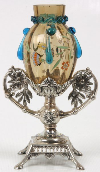 Victorian Silver Plated Centerpiece: Victorian Silver Plated Centerpiece. Silver plated base with pierced filigree design and handles on the sides, signed “Simpson, Hall, Miller & Co. ”; light amber glass inset has a lemon form with 