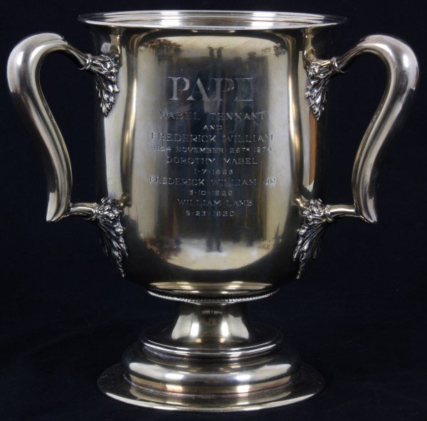Tiffany & Co. Sterling Silver Loving Cup: Tiffany & Co. Sterling Silver Loving Cup. Large cup form with a raised foot and 3 serpentine handles; engraved on the front “Pape – Mabel Tennant and Frederick William – 1924 November 29th, 1974
