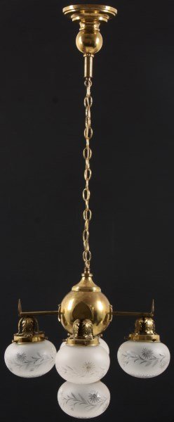 5 Light Brass Hanging Chandelier: 5 Light Brass Hanging Chandelier. Brass fixture has a spherical center cluster with 4 arms branching out from Maltese cross mounts, bell shaped hanging shade fitters and sockets at the ends, decorated