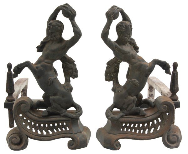 Pr. Figural Cast Iron Centaur Andirons: Pr. Figural Cast Iron Centaur Andirons. Opposite facing figural centaurs hold a large sphere over their head as they rear back, they wear a lions pelt on their shoulders and stand on a pierced decorat