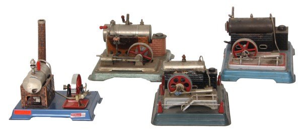 4 Tin Toy Horizontal Steam Boilers: 4 Tin Toy Horizontal Steam Boilers. Jensen Mfg. Co. Style 65; measures 5.5 in. high x 8.5 in. wide x 9 in. deep. 2) Signed Wilesco model, measures 8.5 in. high x 8 in. wide x 5 in. deep. 3) Signed Fle