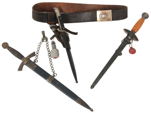 3 German WWII Nazi Daggers: 3 German WWII Nazi Daggers. 1) Eickhorn 2nd model Luftwaffe Dagger with dark orange wire wrapped grip, round pommel with swastika, eagle & swastika on the cross guard, original scabbard, signed “Ori