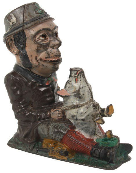 Paddy And The Pig Mechanical Bank: Paddy And The Pig Mechanical Bank. Functional bank, glass eyes do not function completely, one eye is painted over a chip in the pupil; paddy wears a brown jacket with gray cap; c.1882 by J. & E. Stev