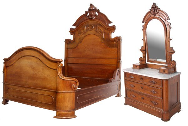 2 Pc. Walnut Marble Top Bedroom Set: 2 Pc. Walnut Marble Top Bedroom Set. Bed has a broken arched crest with scrolling shielded medallion and raised panels, carved and raised panels on the headboard, footboard has an arched crest rail wi